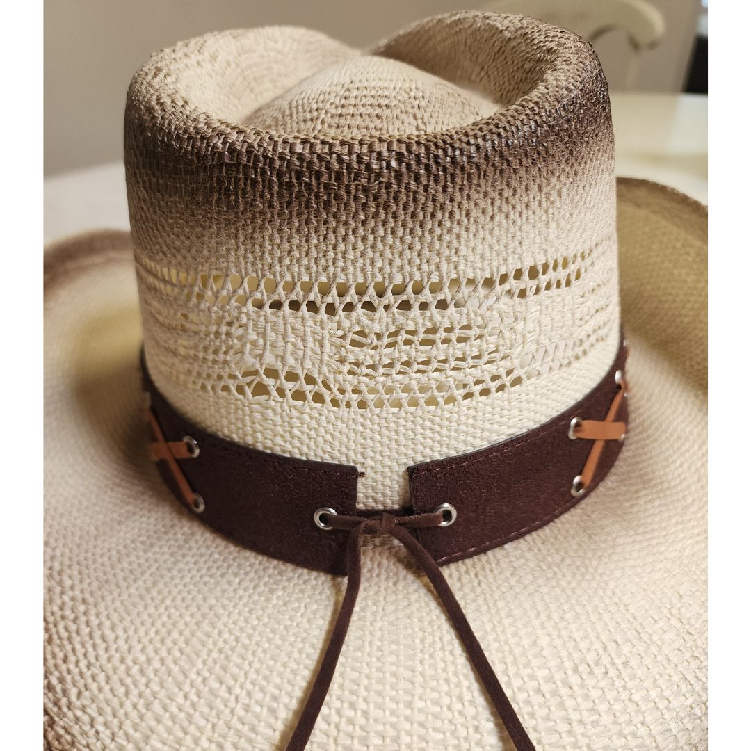 Straw cowboy hat blend and a striking blue gemstone